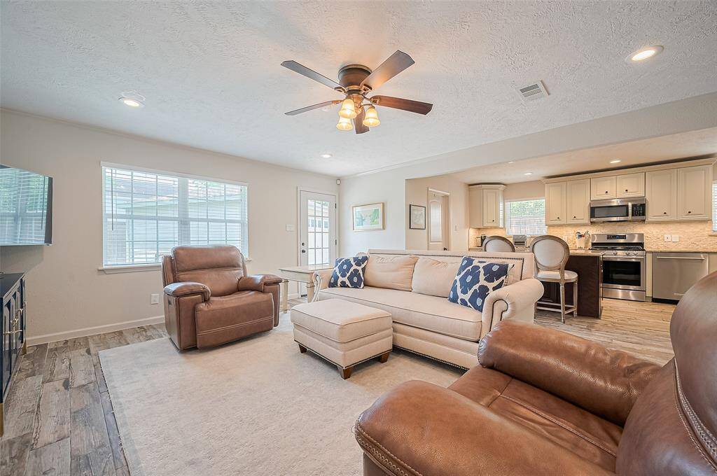 The kitchen sits just behind the inviting living area, creating a seamless flow for everyday living.