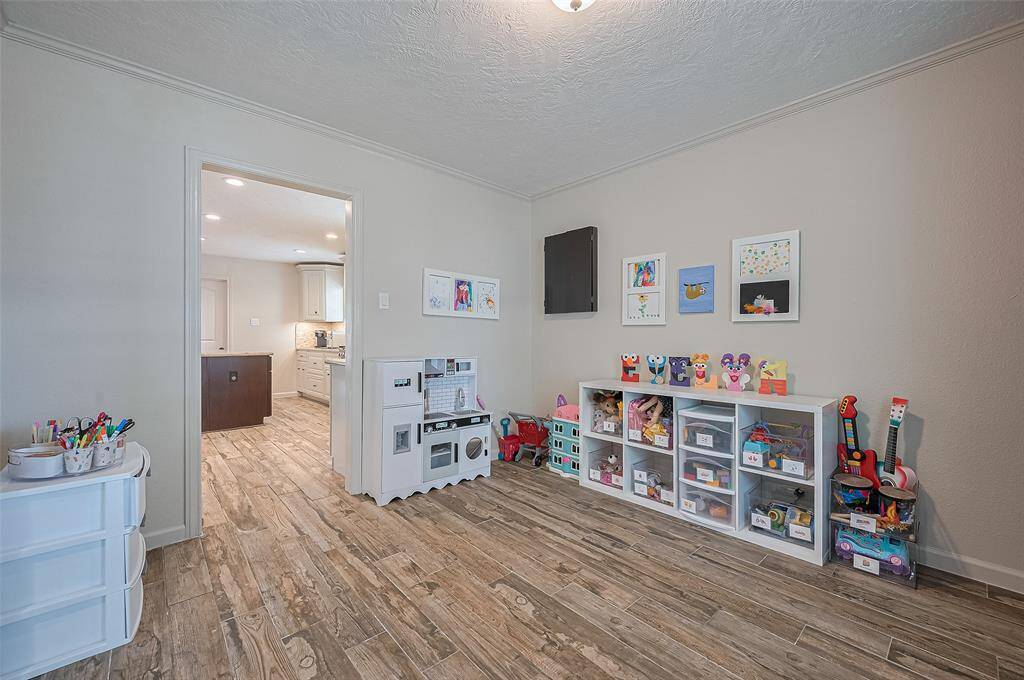 Alternative view of the playroom with entry directly into the kitchen.