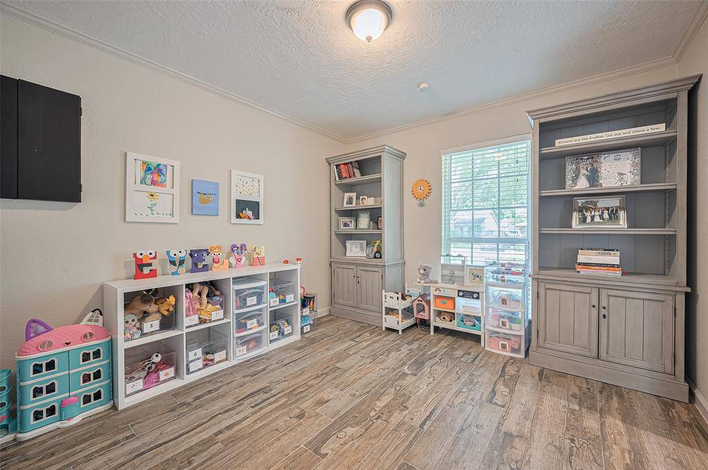 The flex space off the dining room is currently being used as a playroom, offering versatile potential to suit your needs.