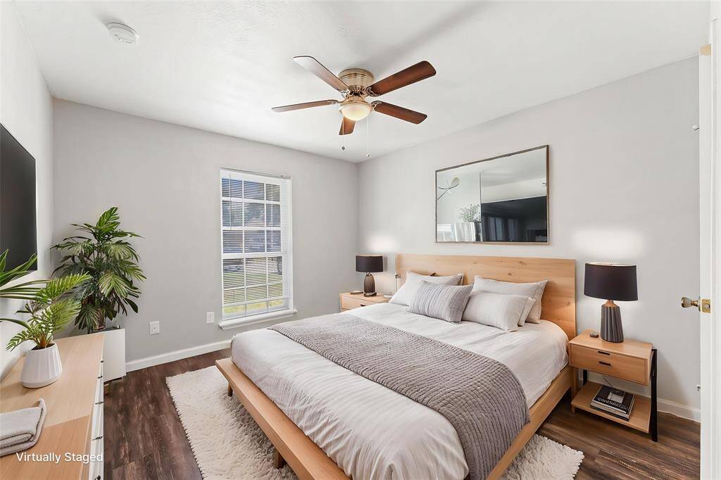 Seen here virtually staged, you'll get a better idea of the amount of space you have for furniture configurations in Bedroom 2.