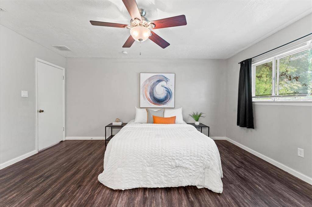 Here is another view of the primary bedroom in this split floor plan.
