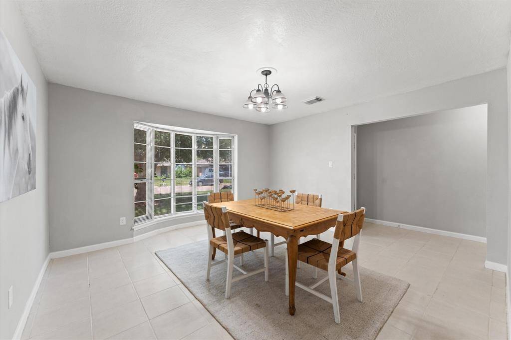 Leave this space open to the entryway or add some French doors to close it in.