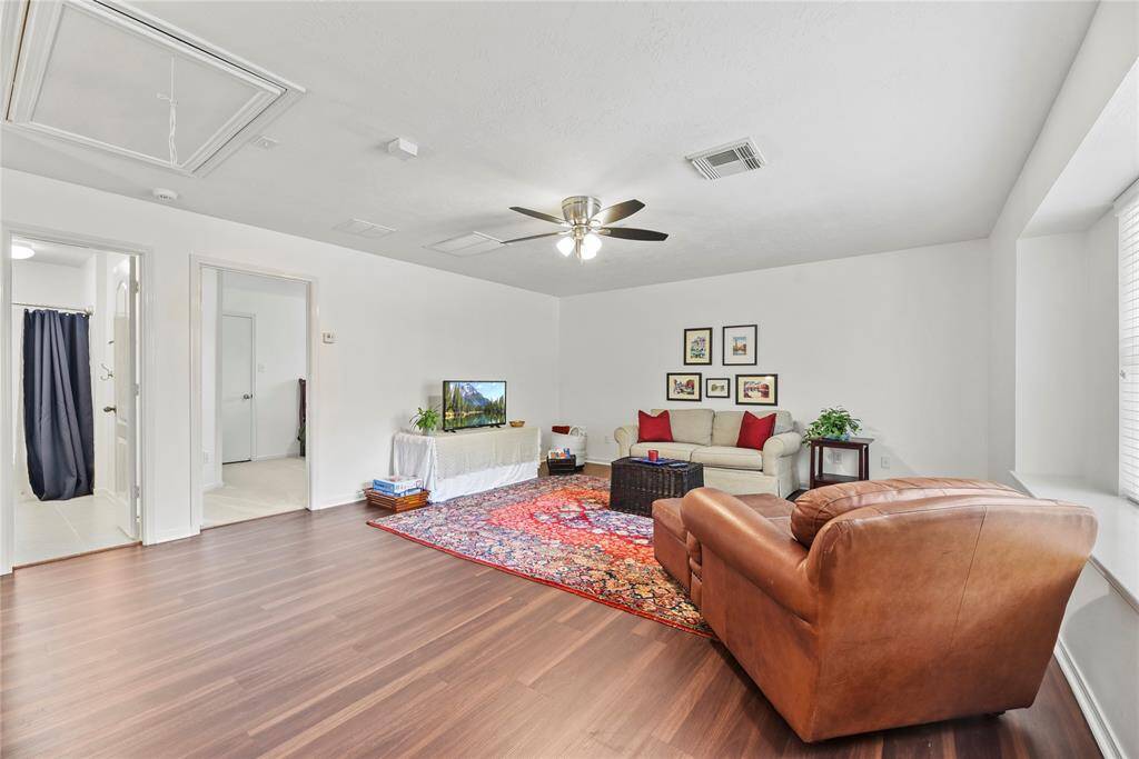 Large game room with new luxury vinyl flooring