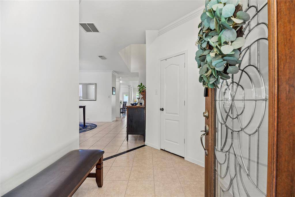 Beautiful Glass door invites you home.