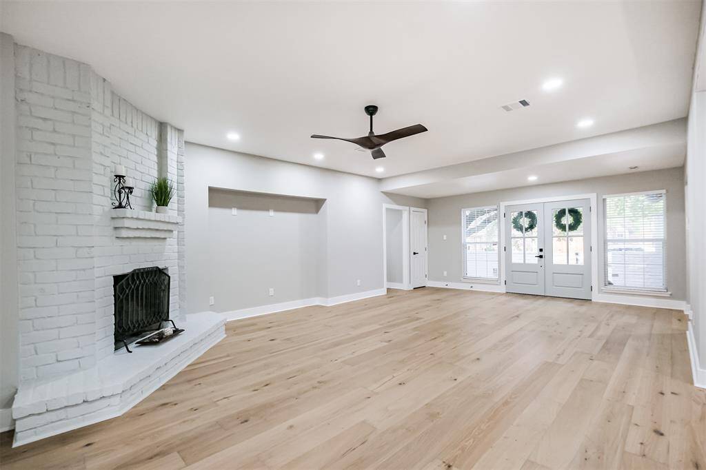 Moving towards the front of the home, you will find a split plan providing much versatility to meet your familiy's needs. Through the hallway to the left you will find the Owner's Suite, 2 bedrooms, a secondary full bathroom and SO MUCH storage!