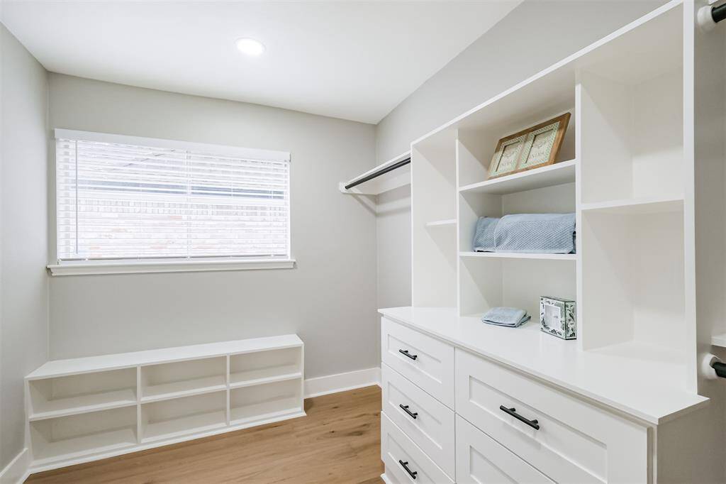 The shoe shelves double in function with the window seat being a convenient place to put on your footwear.