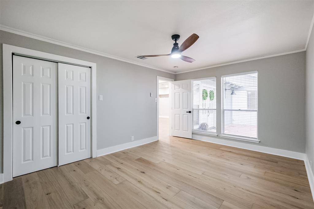 This closet has plenty of storage and the windows provide so much light while overlooking the front porch