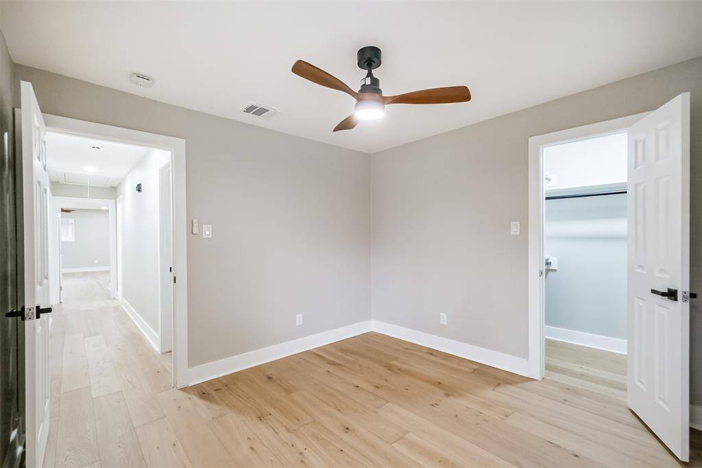 Heading back into the hall to see the other secondary bedroom on this wing. It is just to the right of this room.