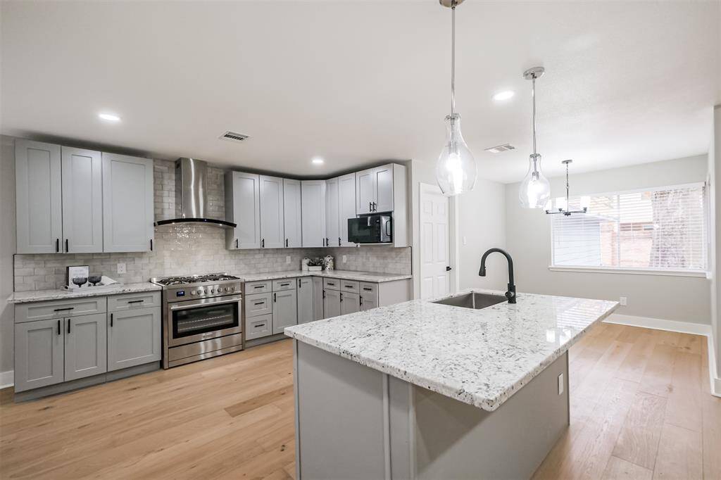 this area, the Lakeside Forest subdivision boasts a LOW 2.0148 Tax Rate.The gourmet kitchen open up into the living space providing maximum family togetherness. The island has plenty of room for informal seating and has gorgeous pendant lighting providing a softer feel when lit alone
