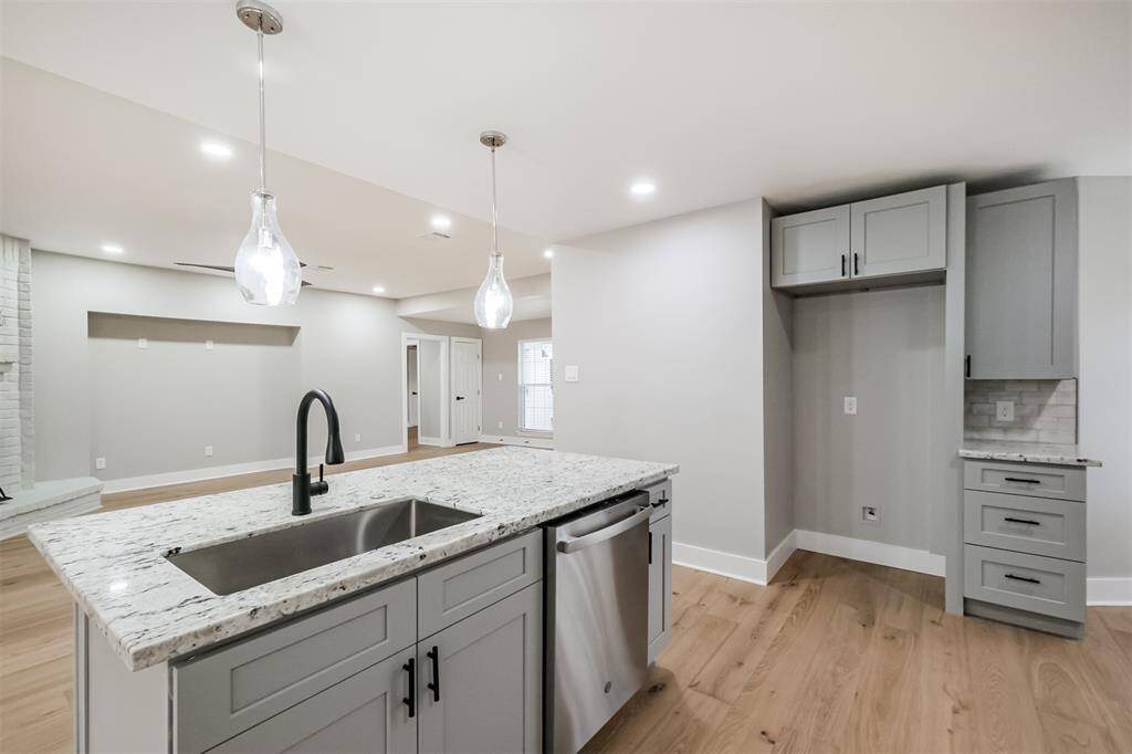 The farmhouse sink and location of the dishwasher make cleaning up a breeze.