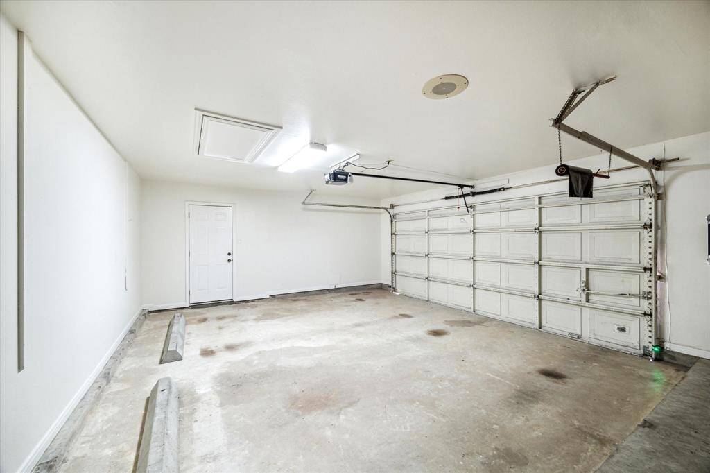 Two car garage with backyard access.