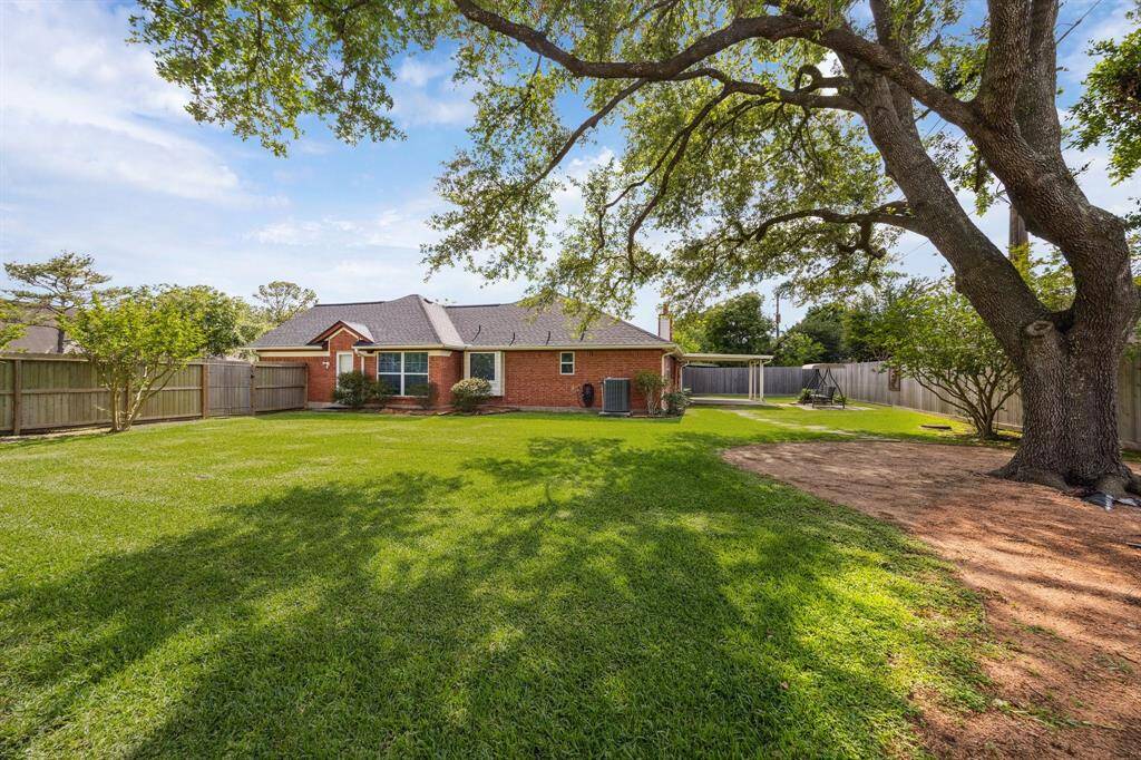 Mature trees provide shade and a calm setting for morning coffee or relaxing after a work day.