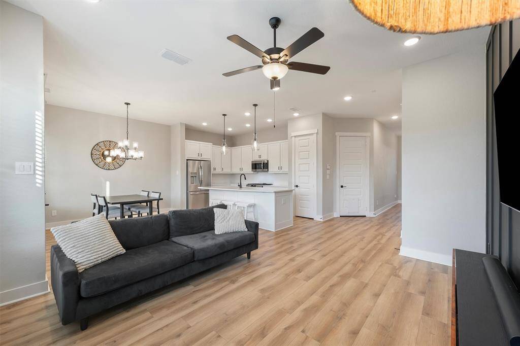 Large living room with plenty of natural light