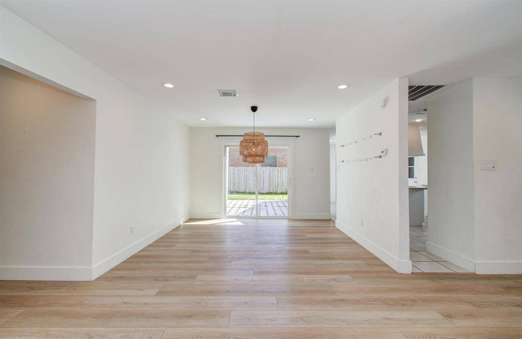 Enjoy a cozy gas fireplace and large windows in the family room.