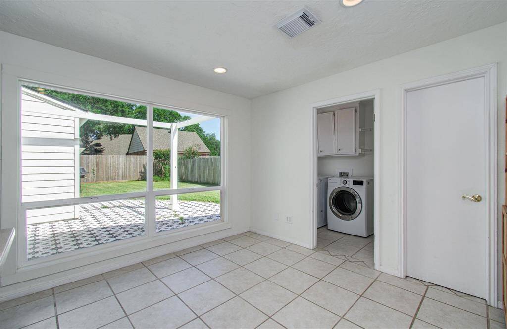 Enjoy breakfast and coffee or tea with backyard views from this breakfast area.