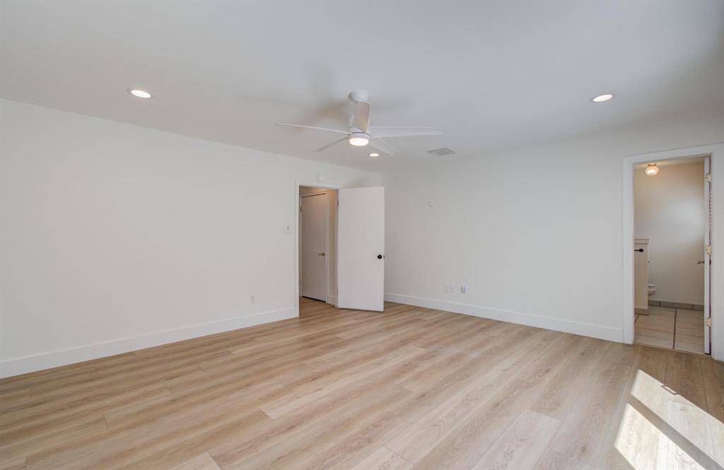 A large walk in pantry can be found off the kitchen next to the dining room.