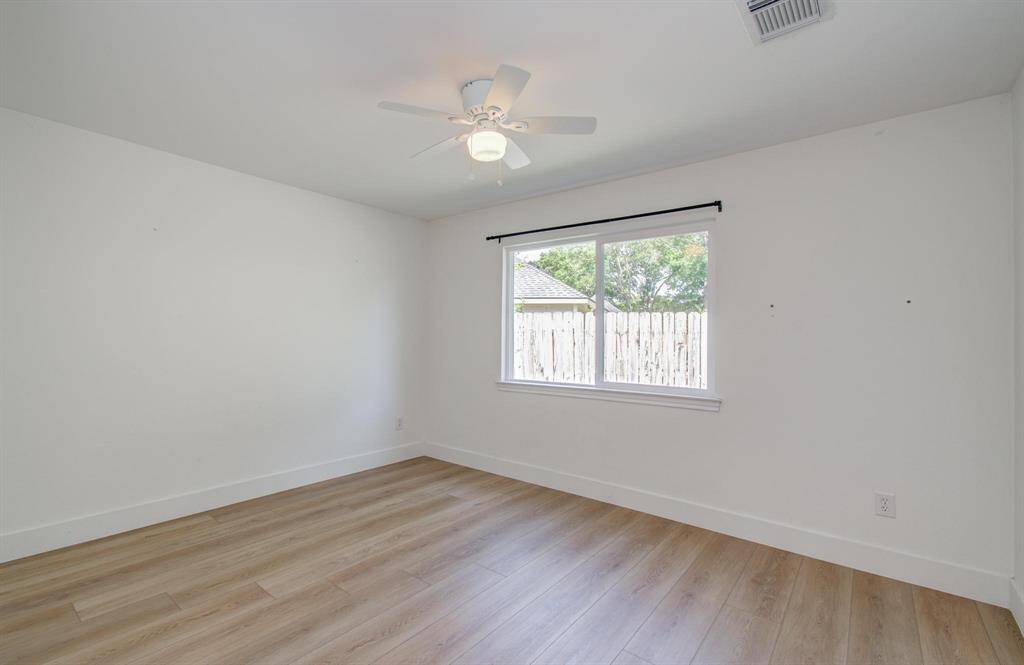 Beautiful primary bath with double sinks, updated countertops, faucets and cabinets.