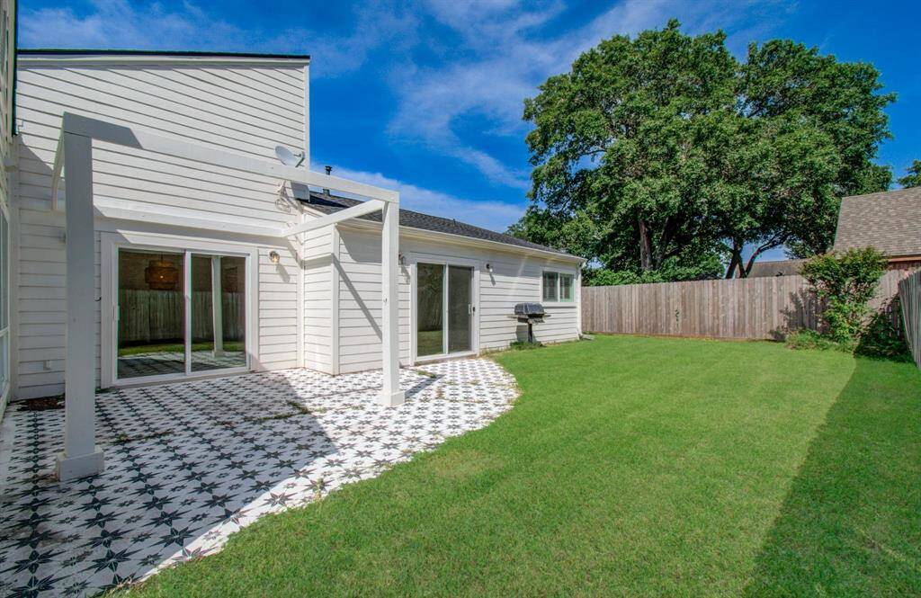 Beautiful hand painted back patio with space for a future pergola and plenty of room!