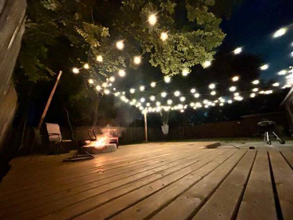 Patio at nights with fire and lights