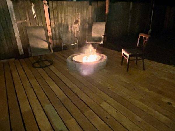 Patio at nights with fire and lights