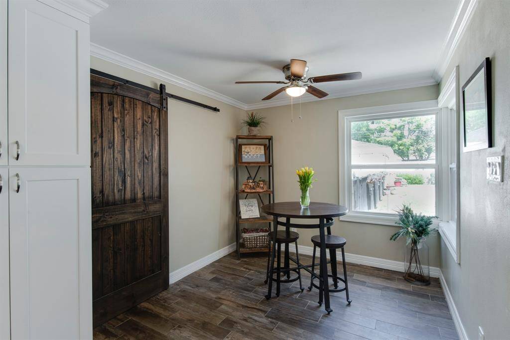 An additional breakfast area or breakfast nook. Windows looking out to the backyard.