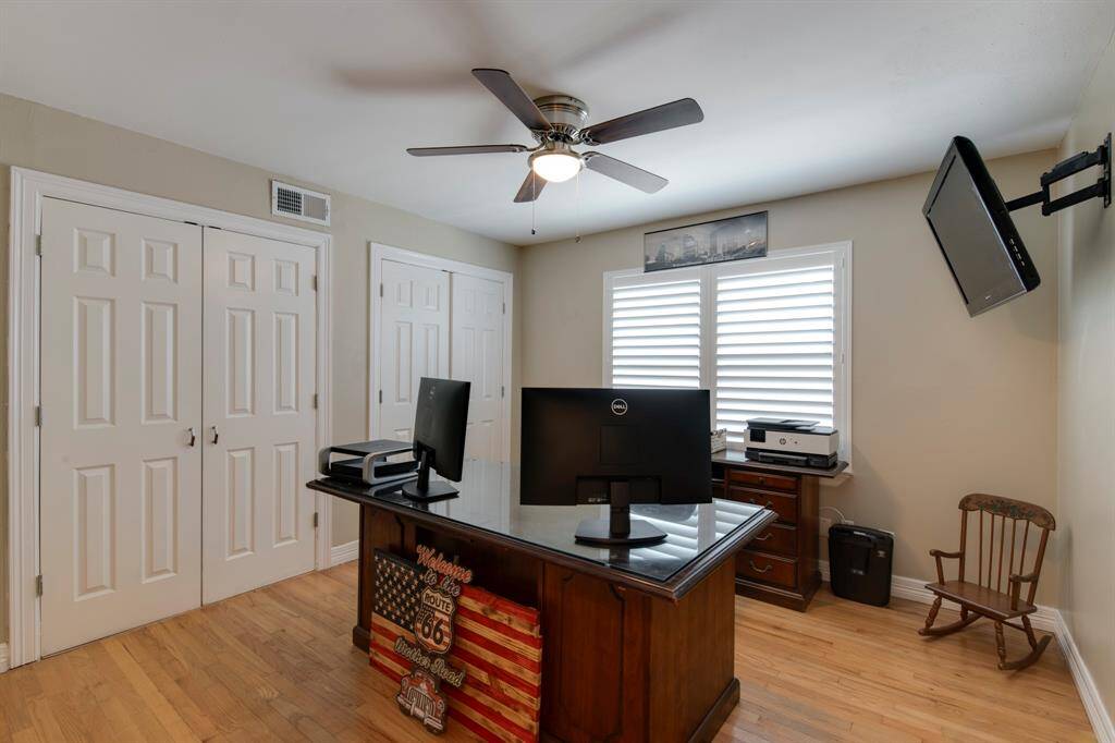 The 2nd bedroom is being used as a study. Look at those 2 closets!