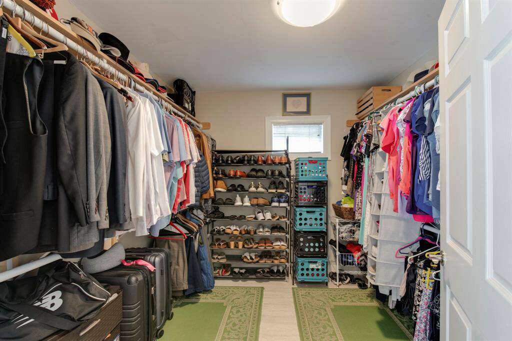 This walk-in closet is spacious.