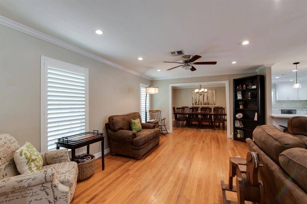 The living room or over flow area. Plantation shutter's throughout