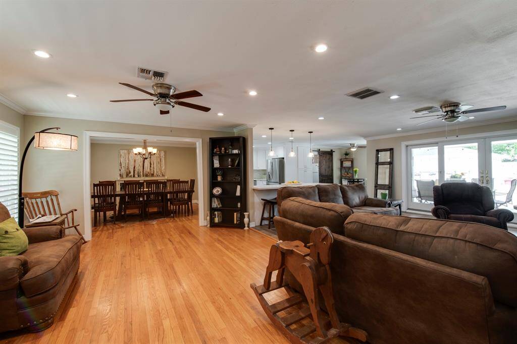 As you enter the area it flows with natural lighting from the front windows as well as the back.