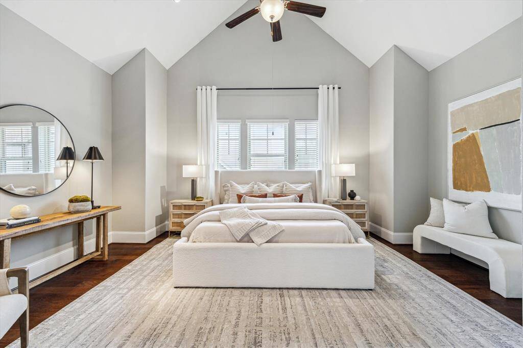 The entire third floor is dedicated to the luxurious primary suite, featuring a dramatic 17-foot cathedral ceiling, recessed lighting, a lighted ceiling fan, and ample space for a comfortable sitting area—creating a serence and private haven.