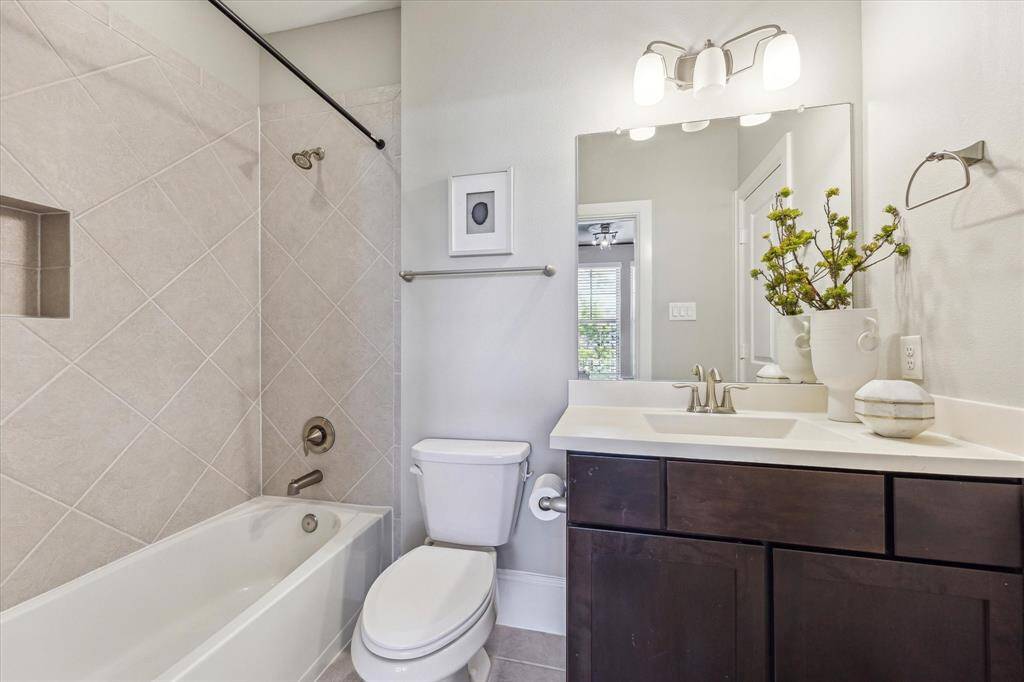 The first floor bedroom also provides a full ensuite bath with tub/shower combination and spacious closet.