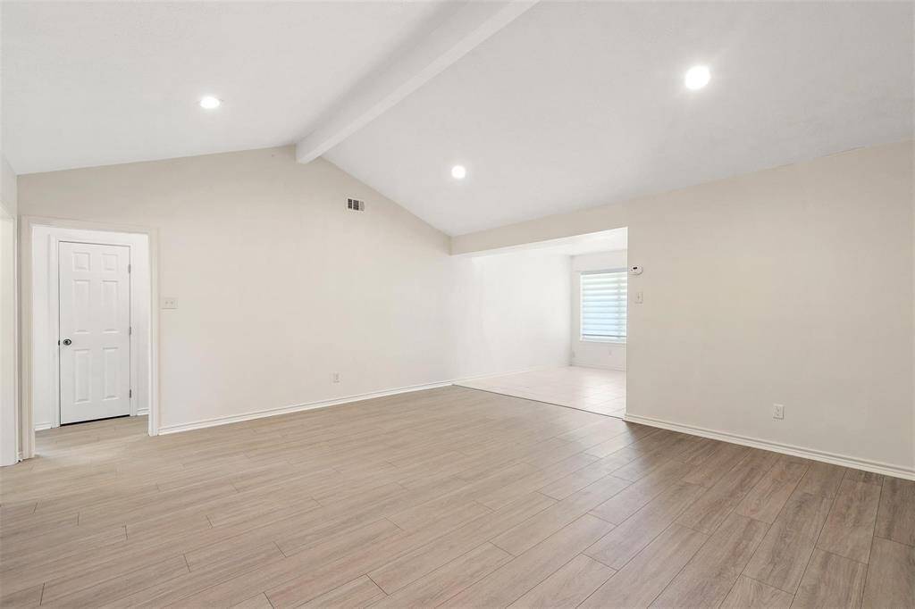 Tall ceilings with beam elevates your daily living.