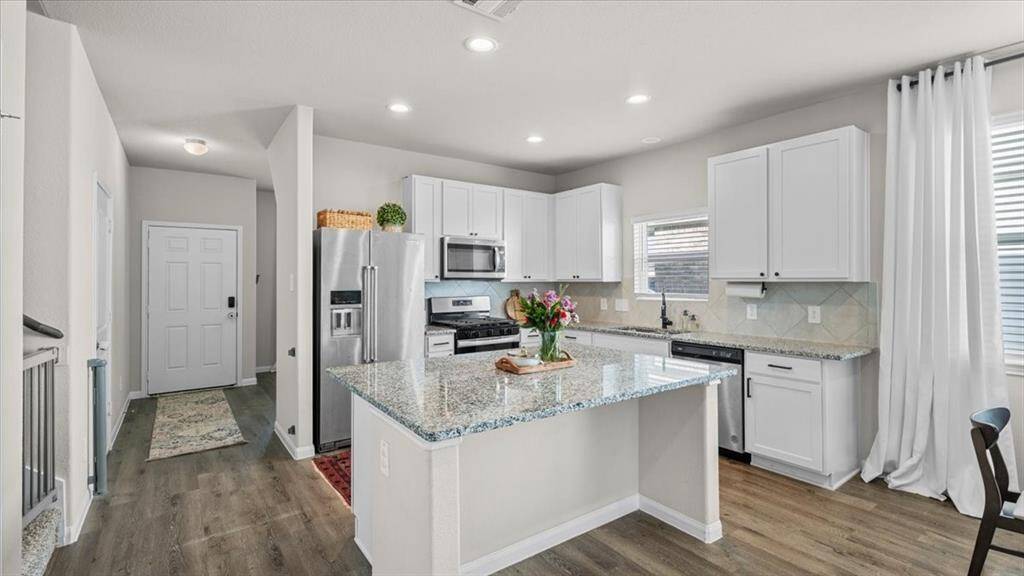Large kitchen island with storage cabinets