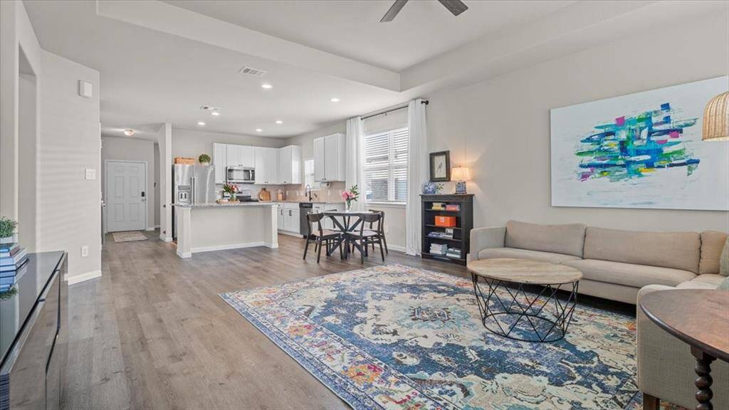 High ceilings throughout and open kitchen to living area