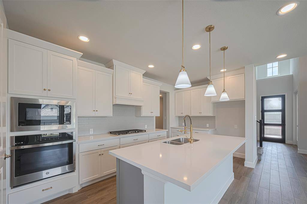 Gorgeous kitchen with coveted island seating and tons of storage