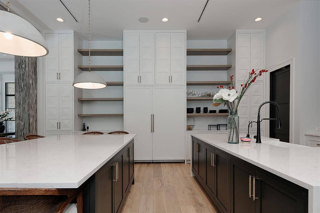 The breakfast bar around the first island means you'll have an entire island to yourself for food preparation!