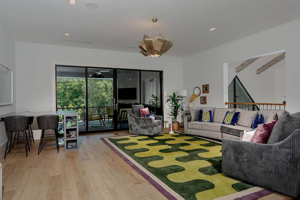 The upstairs game room with balcony will be enjoyed by family of all ages!