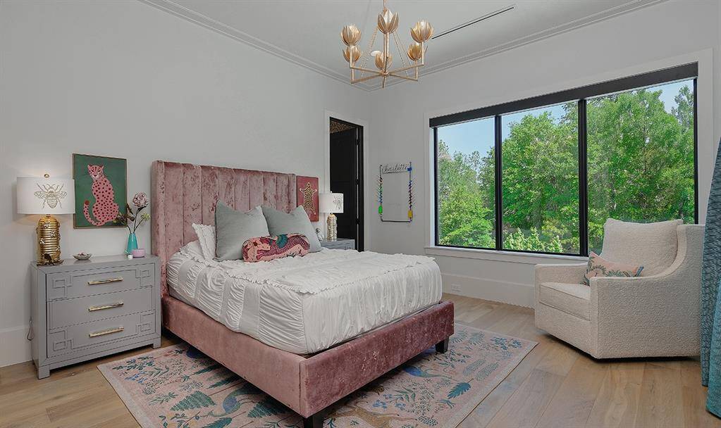 Another guest bedroom suite upstairs - each one is so spacious and allows for large furniture placement.