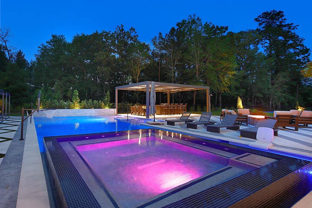 The view from this oversized hot tub shows you how private this backyard is!