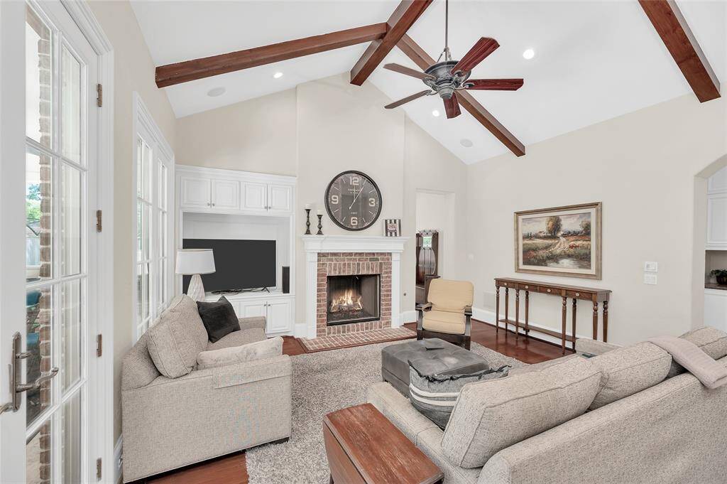 Vaulted ceilings with wood beams in the living room