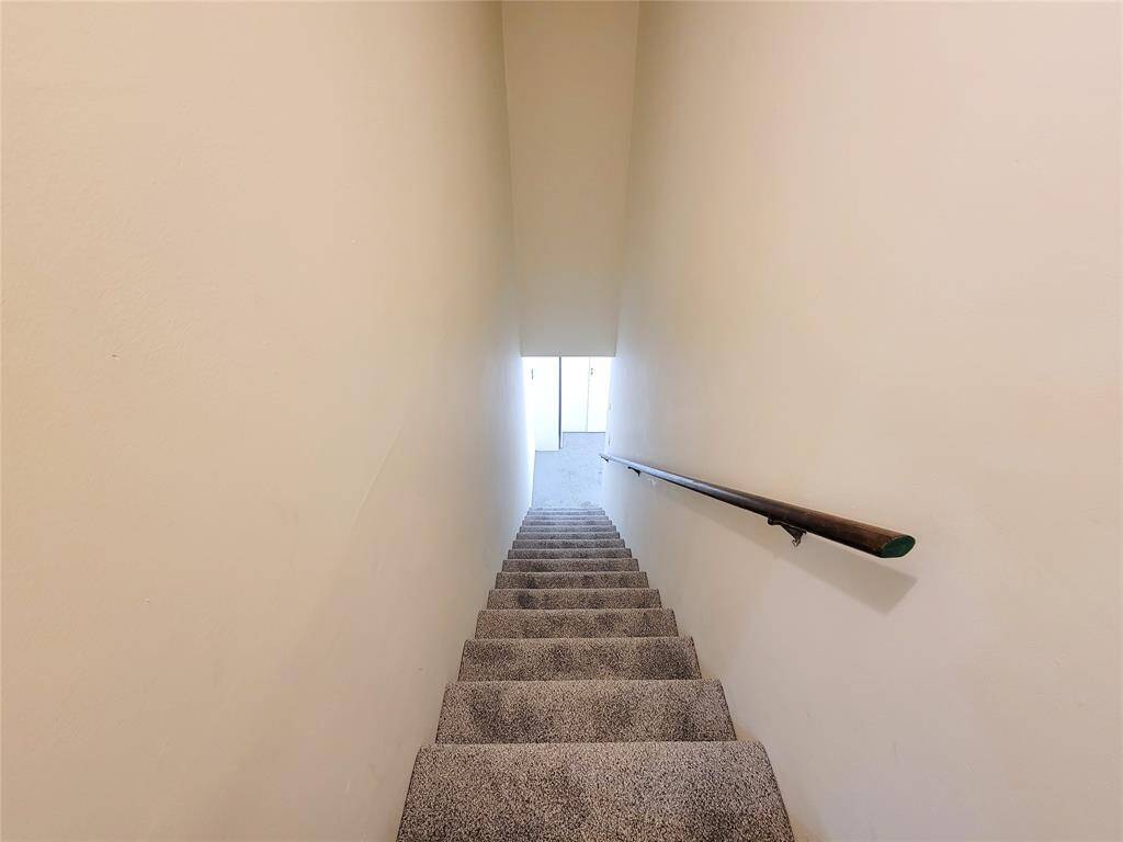 Private stairs from the condo to the garage. Carpet was recently replaced (2025)!