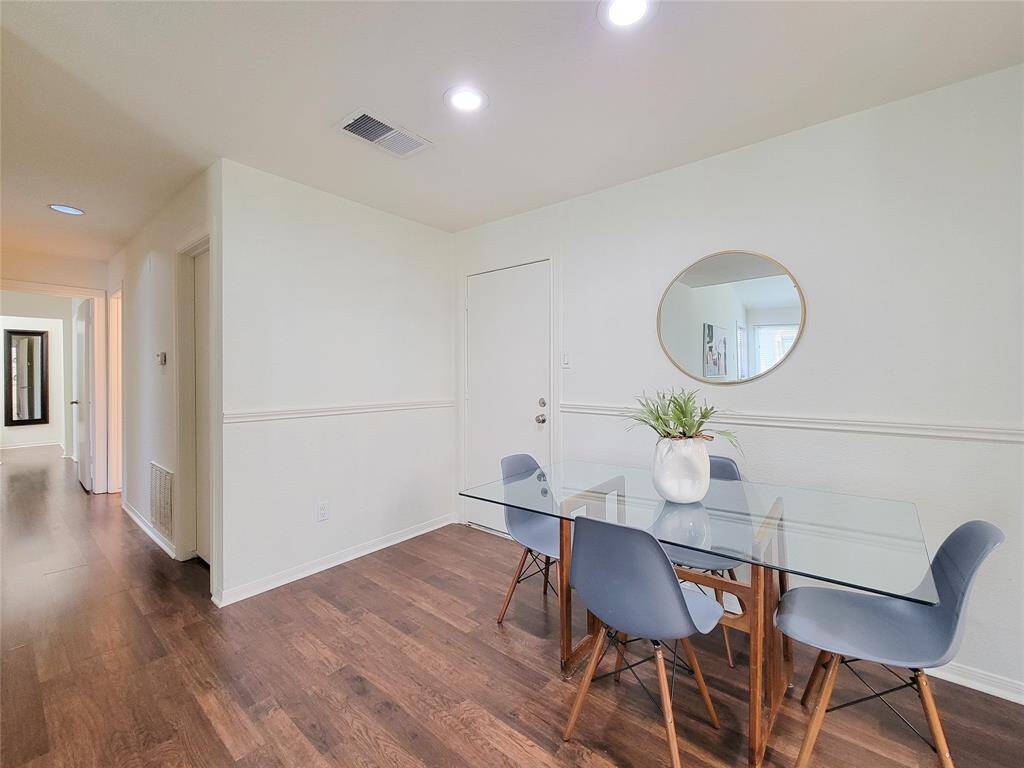Dining area and hallway to bedrooms.