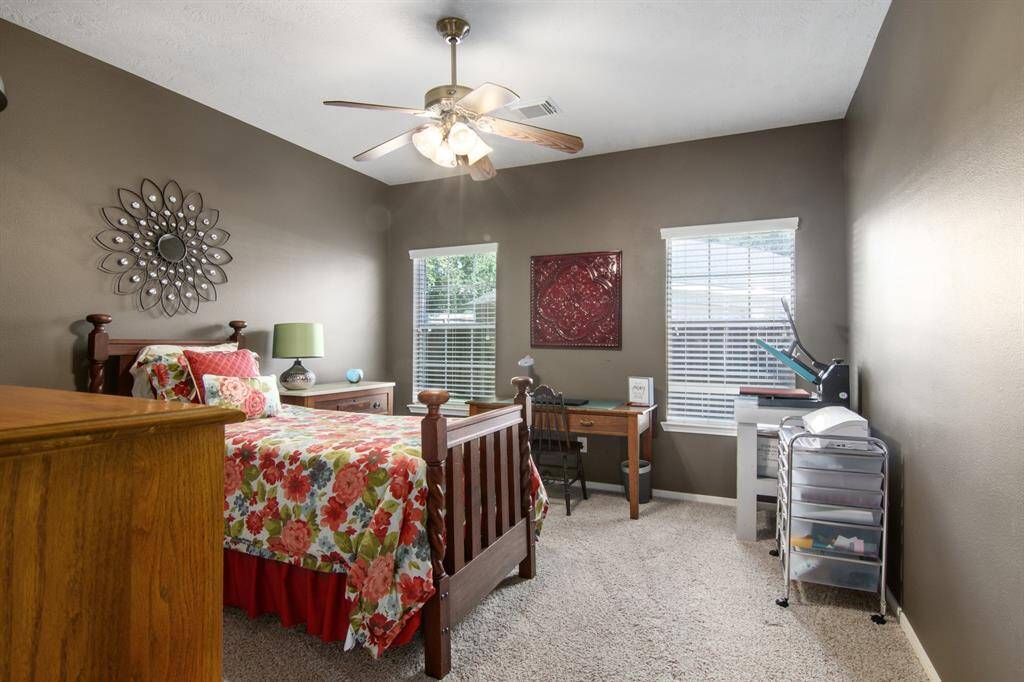 SO, back to the front off the entry and to the right, you find a hallway leading to TWO more spacious bedrooms, another FULL bathroom and laundry space. This is bedroom 3 of 4.