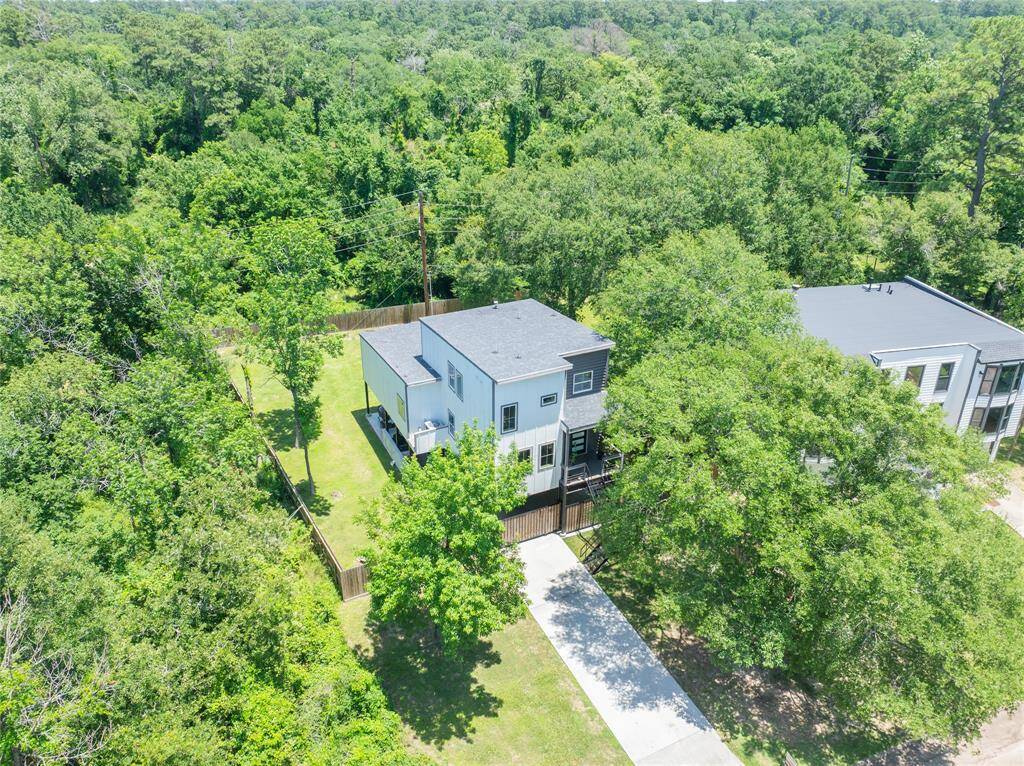 Aerial view of the homes front and back yard.