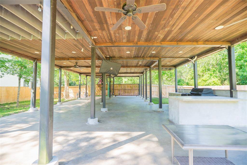 Outdoor gas grill and kitchenette, wired for tv's.  What a great entertaining area!