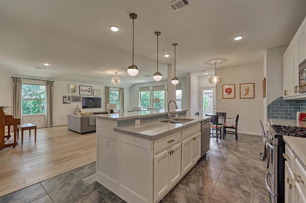 Effortless meal prep in this gourmet kitchen with ample counter space!
