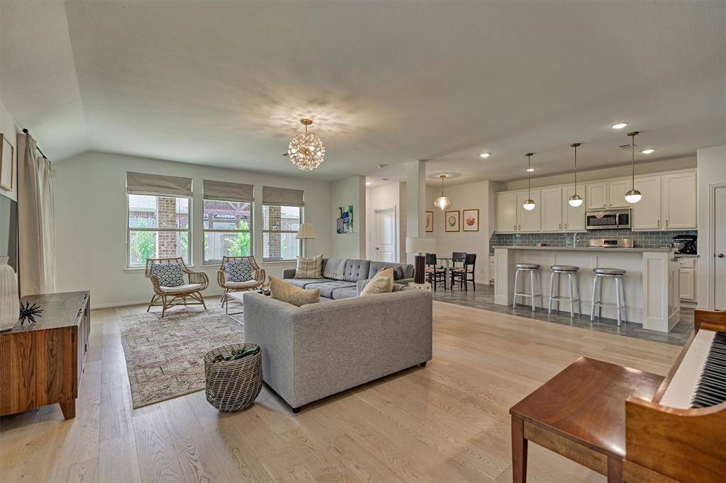 Expansive family gathering space is ideal for watching TV or curling up with a good book!  Bonus -  room for a piano!