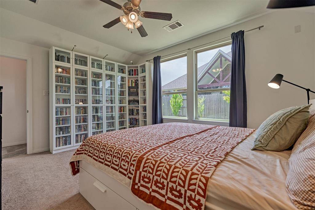Primary bedroom is sizable and offers tranquil backyard views!