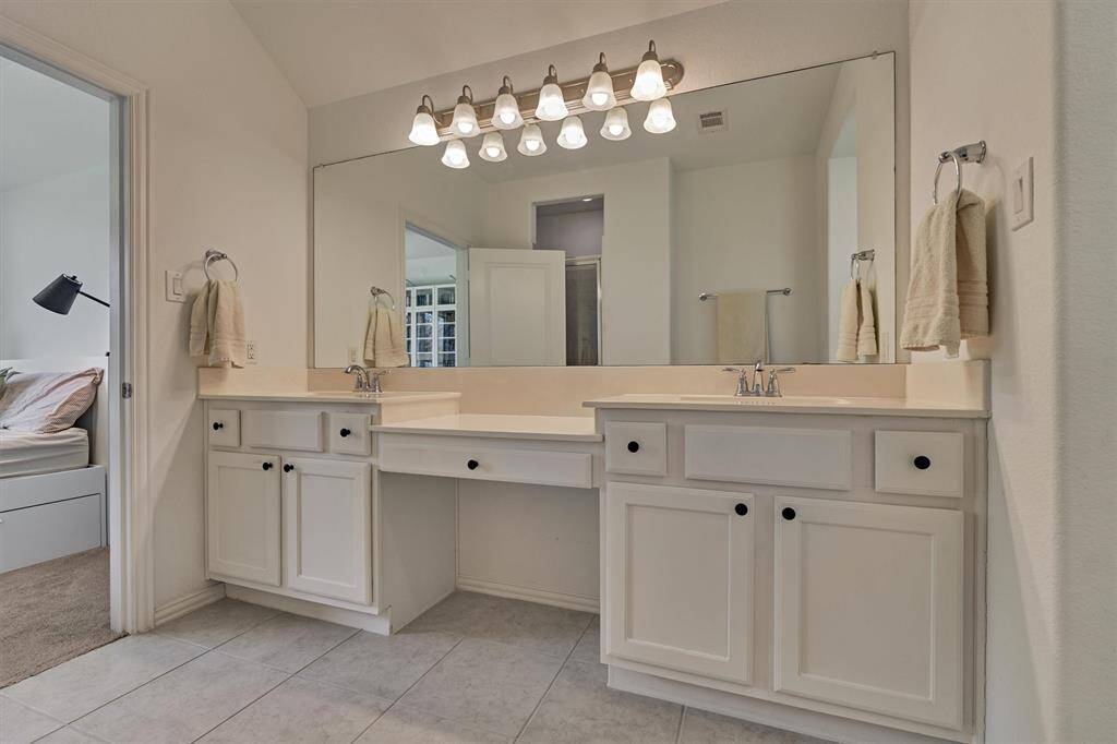 Expansive vanity space for storage makes morning and evening prep a breeze!