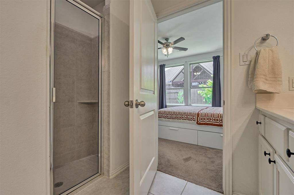 Stall shower with built-in ledge for maximum use of space!